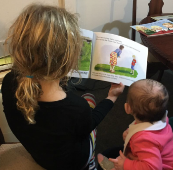 Image of children reading Claire and the Weka.