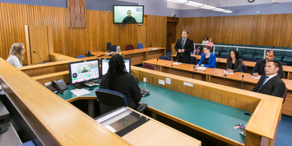 Image of AVL being used in a court room.